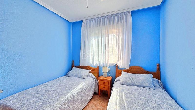 Foto 3e3348f4-2512-49dd-b8c5-48ec8ec55600. Dúplex encantadora casa adosada de dos dormitorios con piscina comunitaria cerca del mar en Orihuela