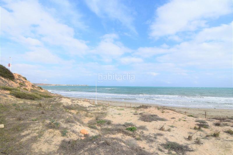 Foto bf630b69-4a55-4e93-950d-d5684733080e. Planta baixa amb aparcament piscina a Campoamor Orihuela