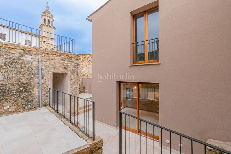 Foto 189a4f6e-3d53-4ce2-89ec-8122a14b38c1. Casa adossada amb calefacció piscina a Mancor de la Vall