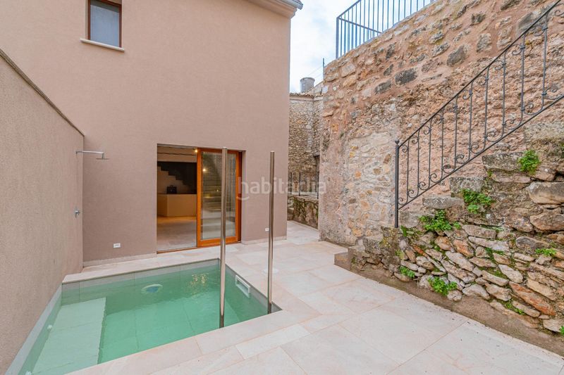 Foto c75e69fc-d40e-47f6-8778-5ad1db92f4a9. Casa adossada amb calefacció piscina a Mancor de la Vall