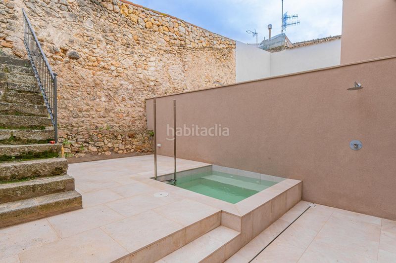Foto d8e22f32-7e32-48b6-bcbf-e4ea35a91b3b. Casa adossada amb calefacció piscina a Mancor de la Vall