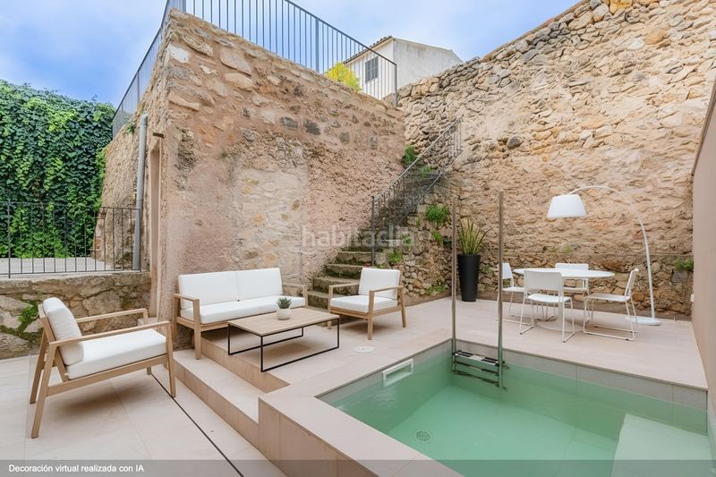 Foto f4f7440b-0384-4dcf-a328-2b86dbe280e3. Casa adossada amb calefacció piscina a Mancor de la Vall