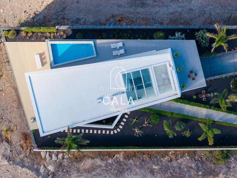 Foto 2431c124-0061-4c65-88e0-c5dad534c5e1. Maison avec chauffage parking piscine dans La Caleta Adeje