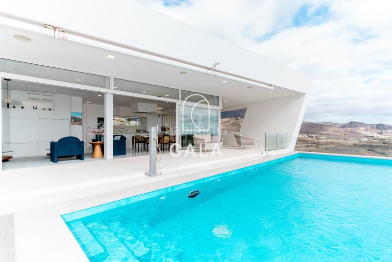 Foto 88c8ef99-050c-4ba0-b7d6-572d05d9a9f4. Maison avec chauffage parking piscine dans La Caleta Adeje