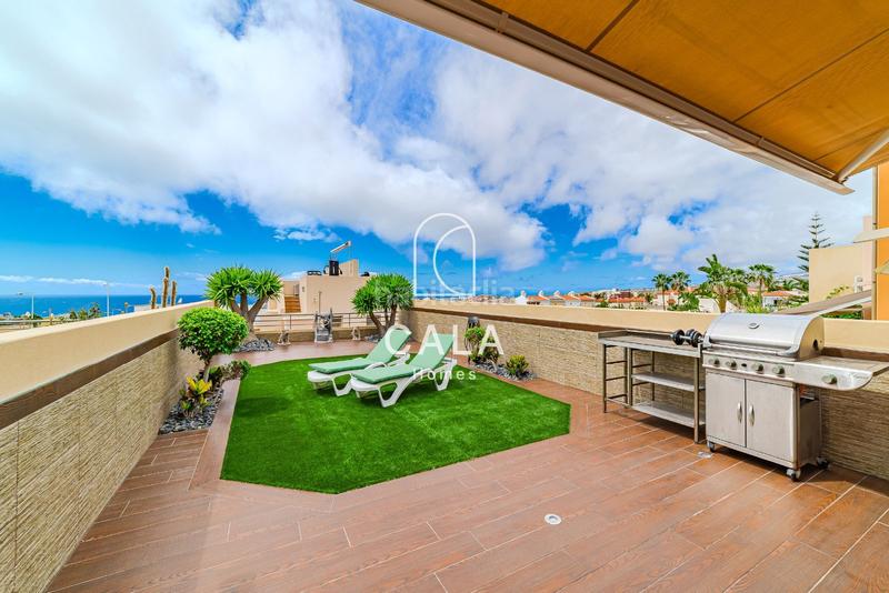 Foto 6581c7ee-04ff-40a7-9fe4-e2f3e818a7fa. Casa a schiera con riscaldamento parcheggio in Playa Fañabé Alto Adeje