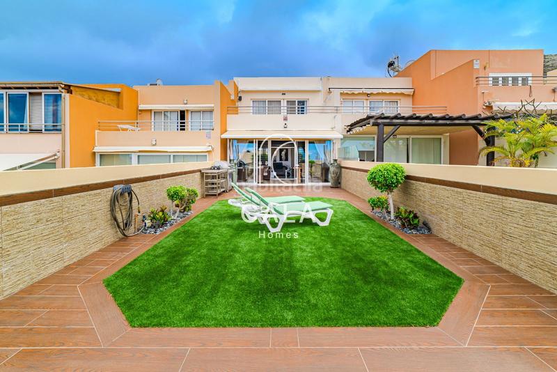 Foto a3ed863d-a5c3-4228-a49e-69a39bcedb1f. Casa a schiera con riscaldamento parcheggio in Playa Fañabé Alto Adeje