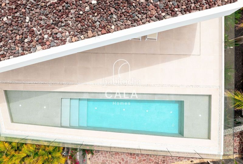 Foto 0be46261-7f0f-4070-9ad5-c1a5ebb574bc. Casa amb calefacció aparcament piscina a Abama Guía de Isora