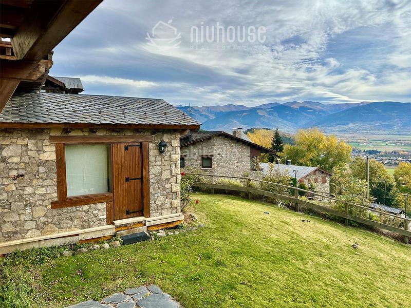 Foto 7d75fb0c-ba2d-43eb-b9ff-4a3a6e71c1a2. Maison jumelée avec parking dans Llívia