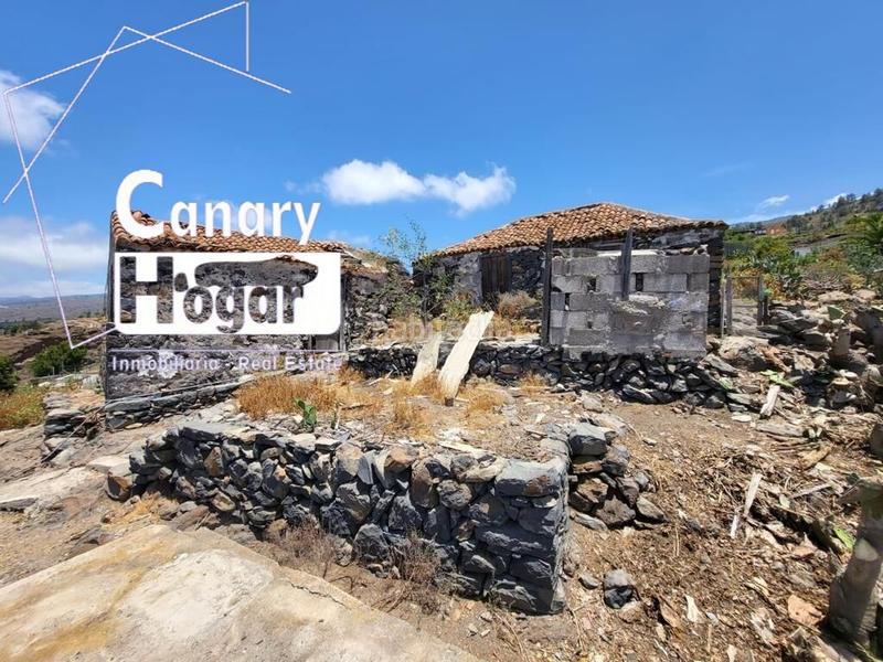 Foto b48fdc6c-3518-4a8d-9666-96c7f6a9f5fd. Masia amb aparcament a Guía de Isora interior Guía de Isora