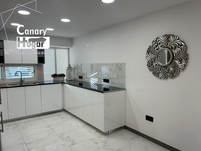 Foto fa12995e-4c6e-4608-b659-5be3f2c6c04e. Casa a schiera con parcheggio piscina in Playa Fañabé Alto Adeje