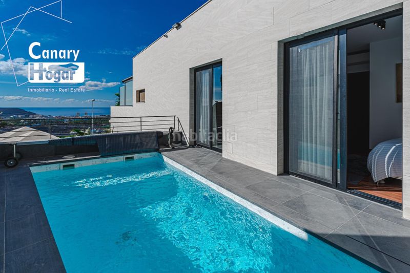 Foto 13338594-dc4e-42a6-a428-7ffd6a10e03c. Xalet amb aparcament piscina a San Eugenio Alto Adeje