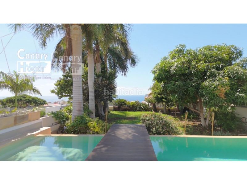 Foto b6ce18bc-e7b8-4702-a66a-307ffbb23e6e. Casa amb aparcament piscina a Playa Fañabé Alto Adeje