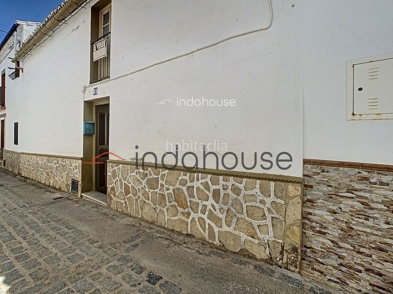 Foto bd78ec40-4d3e-4015-810d-675d8cc25955. Casa adossada amb aparcament a Setenil de las Bodegas