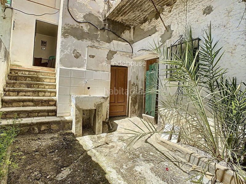 Foto ef8bca1e-f430-4d15-be58-be66a0b88923. Casa adossada amb aparcament a Setenil de las Bodegas