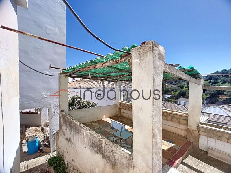 Foto f4c985b8-89f3-4270-a0bd-4bb406400437. Casa adossada amb aparcament a Setenil de las Bodegas