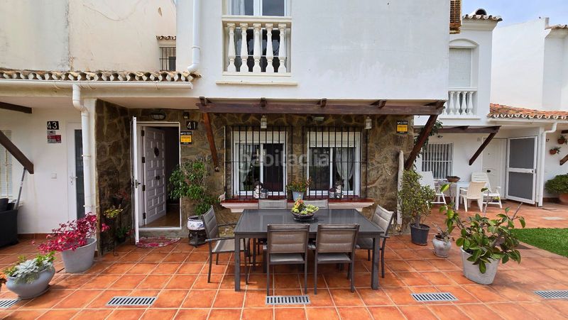 Foto 2e23f1a9-b1e3-47b1-bdd3-b11bf5609ad8. Casa adossada amb calefacció aparcament piscina a Málaga