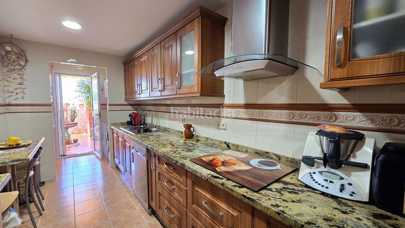 Foto a5983736-1e87-48ac-b03b-9eb96662e19d. Casa adossada amb calefacció aparcament piscina a Málaga