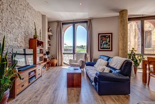 Appartamento in Centre. Exclusiu habitatge amb encant industrial i box privat al centre
