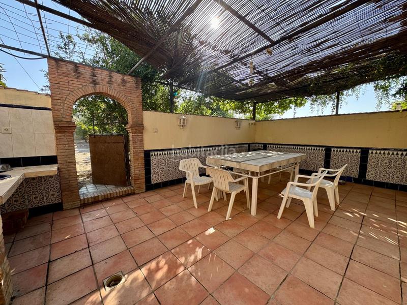 Foto 06c7cda0-8193-4f64-b759-c97602f8da74. Chalet casa independiente en planta baja con piscina, porche con barbacoa y terrazamirador. en Alhendín