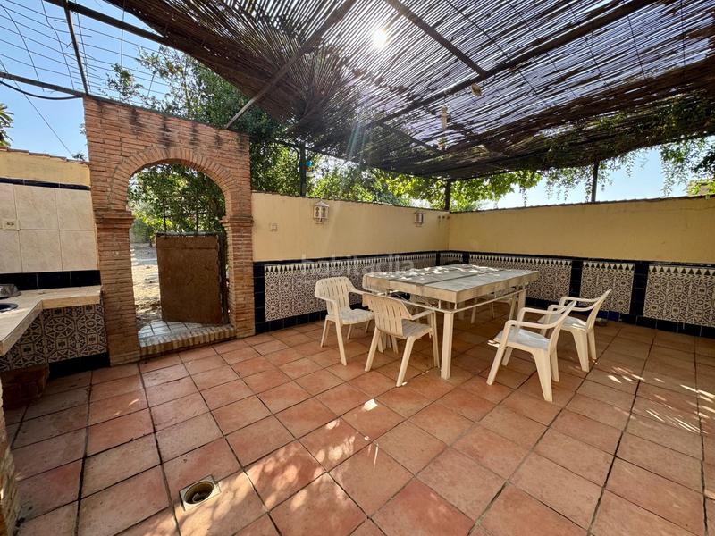 Foto 26fa37b9-3298-442b-8328-bce6d5f61a40. Chalet casa independiente en planta baja con piscina, porche con barbacoa y terrazamirador. en Alhendín
