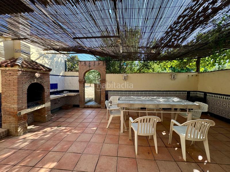 Foto 3763241b-9dbd-48c3-9395-8c12d097394c. Chalet casa independiente en planta baja con piscina, porche con barbacoa y terrazamirador. en Alhendín