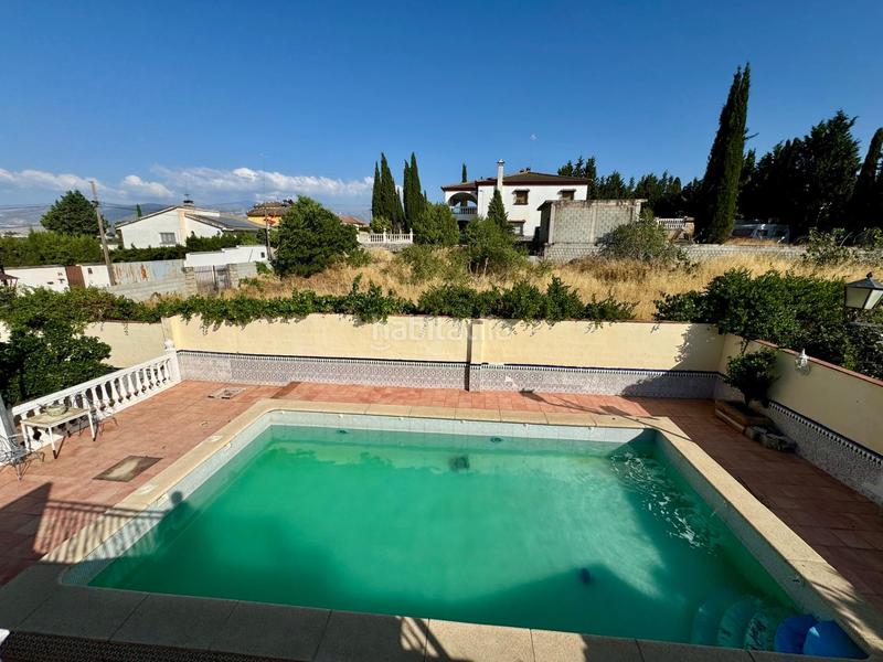 Foto 834c82cb-0a74-424e-b66a-72019ff32037. Chalet casa independiente en planta baja con piscina, porche con barbacoa y terrazamirador. en Alhendín