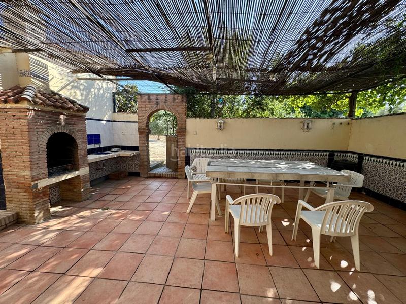 Foto bb27e836-0e14-4821-beaf-168401297dfa. Chalet casa independiente en planta baja con piscina, porche con barbacoa y terrazamirador. en Alhendín