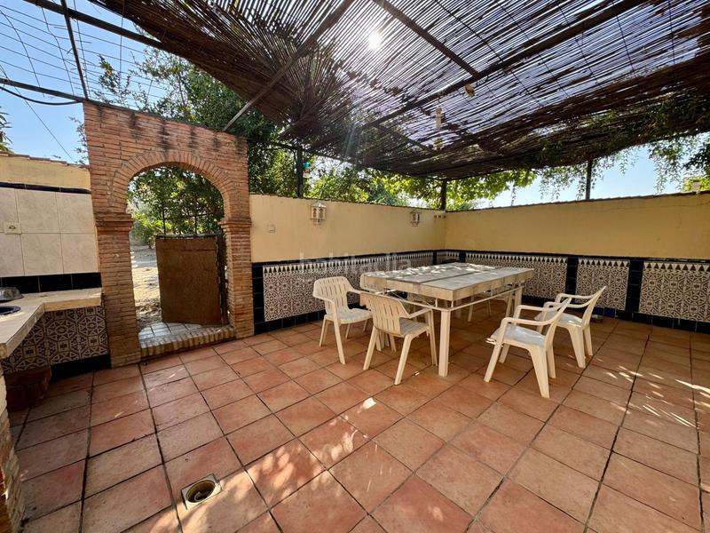 Foto e8ff80eb-b1db-4e6c-a126-baff8a7d9c3e. Chalet casa independiente en planta baja con piscina, porche con barbacoa y terrazamirador. en Alhendín