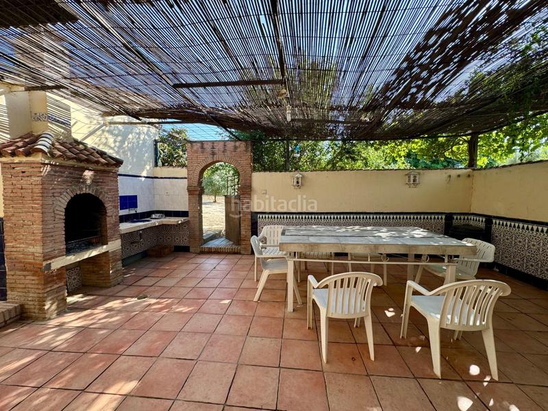 Foto f27693e2-ec92-4434-83cc-7bea96aa4614. Chalet casa independiente en planta baja con piscina, porche con barbacoa y terrazamirador. en Alhendín