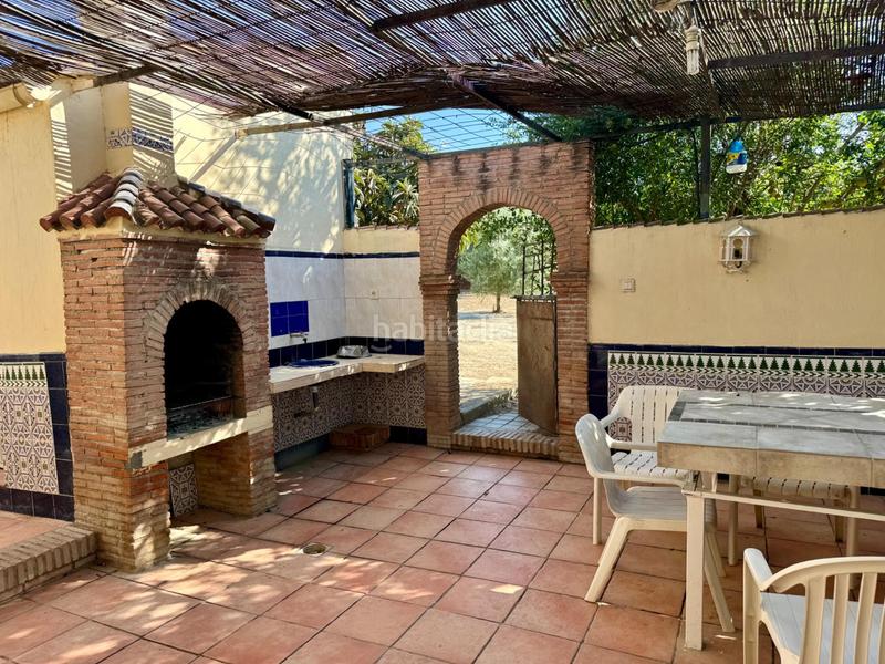 Foto f3dad773-7226-4561-af79-051654b04c96. Chalet casa independiente en planta baja con piscina, porche con barbacoa y terrazamirador. en Alhendín
