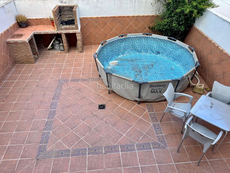 Foto cae7b695-f913-4352-b430-3e1e5a47d8f3. Casa adossada amb aparcament a Belicena Vegas del Genil