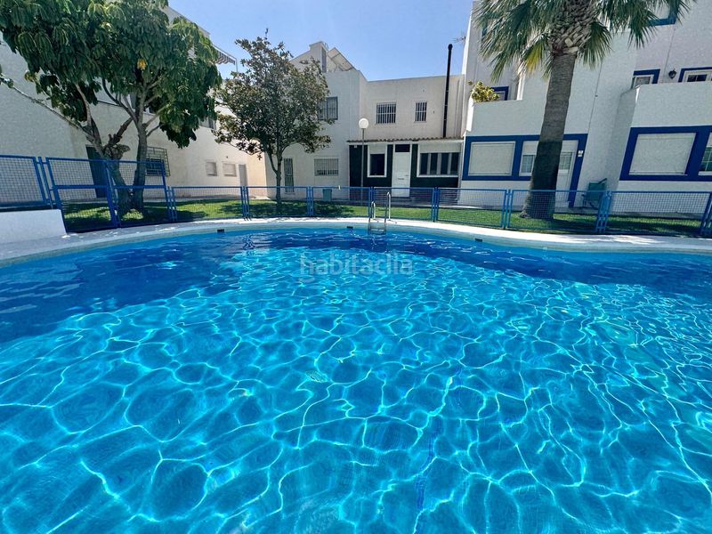 Foto 12e71817-9e40-4162-8d40-1ad3b2f7fb0f. Casa adossada amb aparcament piscina a Aguadulce Norte Roquetas de Mar
