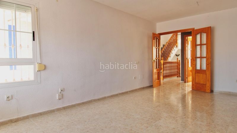 Foto a81ab95f-6360-489c-80b6-eb2fb0adc6bc. Casa adossada amb aparcament piscina a Aguadulce Norte Roquetas de Mar