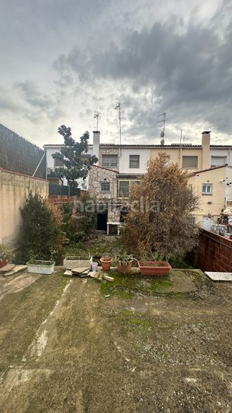 Foto 45ac97c9-b06a-4a9a-8a30-9a6a7ea8dca2. Casa aparellada amb calefacció aparcament a Centre Rubí