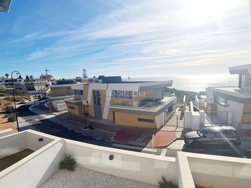 Foto 50316b9c-c81a-4a45-946c-a8ab340e0e6f. Affitto casa a schiera con parcheggio piscina in El Faro de Calaburra - Chaparral Mijas