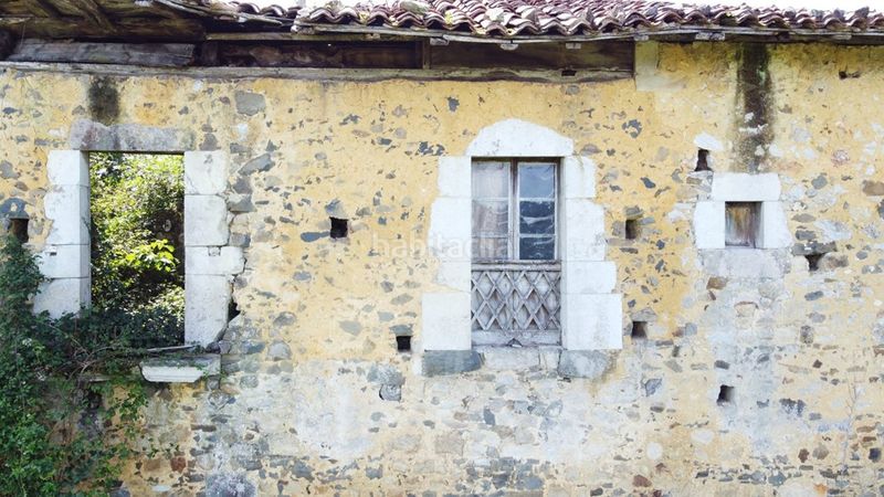 Foto eddb2c7a-3e8d-4cb7-adb1-6a388727fad1. Casa adossada a Piloña