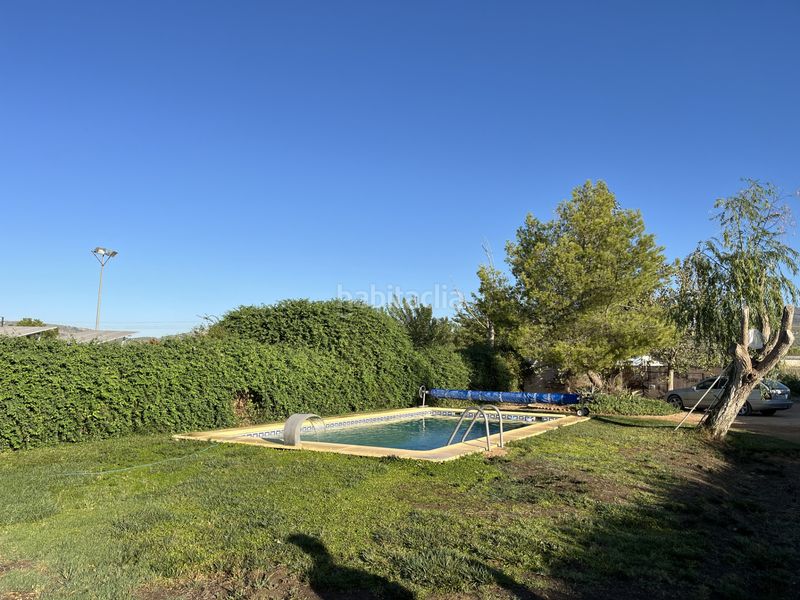 Foto abbfba94-64a2-4265-8aa0-5c8d7a62ebfb. Masia amb piscina a Huétor Tájar