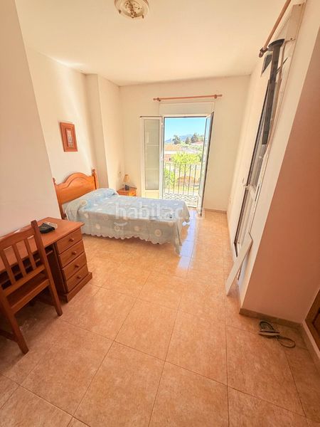 Foto f2cfd3e1-eb8c-42a4-9ecc-1a54837bded4. Casa adossada amb xemeneia aparcament a Ardales