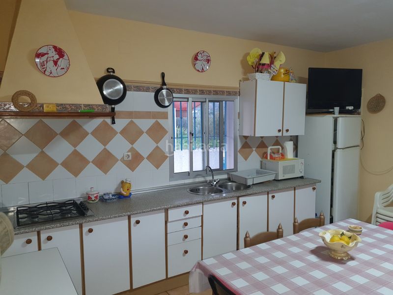 Foto f2f67616-a4bf-40f1-9e38-3151535e58fd. Casa amb xemeneia piscina a Álora