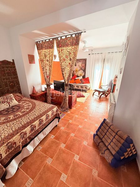 Foto a09c420e-da39-4994-86c6-7a3816980a9c. Casa adossada a Álora