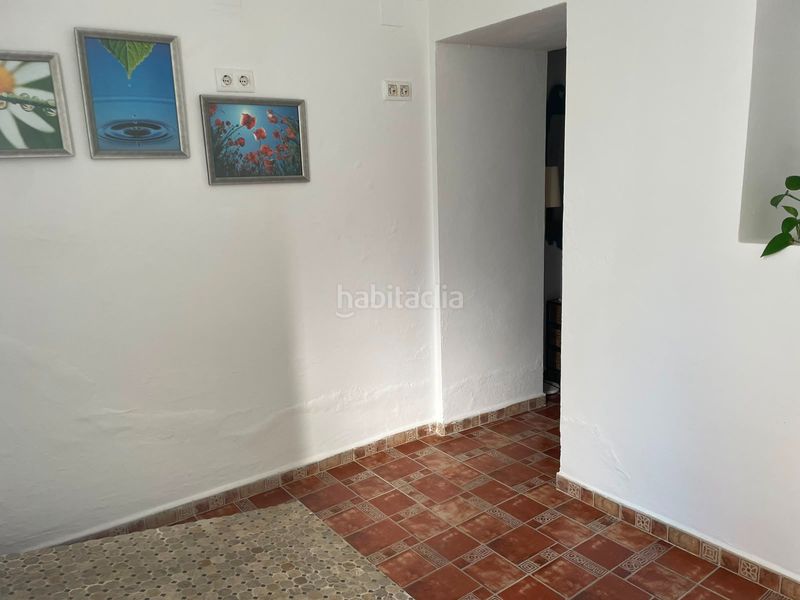 Foto f0a4e4ae-6cb4-49a1-adaf-554254d722d9. Casa adossada a Álora
