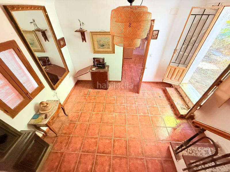 Foto 09bd51a1-c6a8-4a6f-852a-7b1d3289e0b3. Masia amb xemeneia aparcament a Archidona