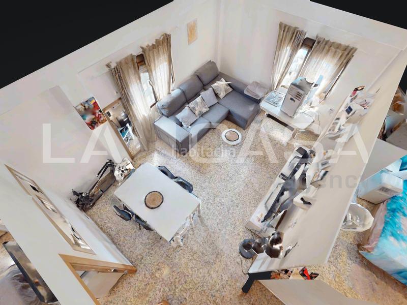 Foto 3d60d201-42da-444d-bc03-d23703ac3c40. Piso  en venta en calle del campament en Benimàmet Valencia
