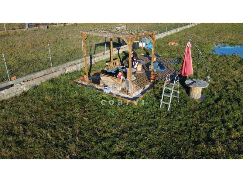 Foto 233a0179-6255-4af4-92c6-bdf3b8fe2de2. Terrain résidentiel dans San Cibrao das Viñas