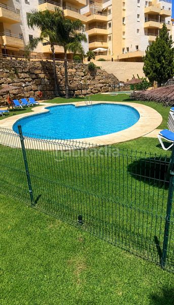 Foto 2c8e11c3-ef8f-4a0f-8a95-9d9b4a0e1ad4. Planta baixa amb aparcament piscina a Riviera del Sol Mijas