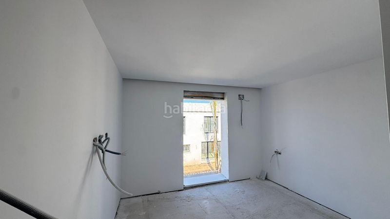 Foto 53c8ff0d-6775-4bab-a459-2f8f10b42c68. Casa aparellada amb calefacció aparcament piscina a Alhaurín de la Torre