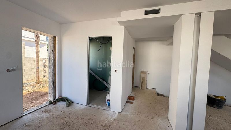 Foto 952a5289-4aba-44d6-9c89-6a6f82b833e7. Casa aparellada amb calefacció aparcament piscina a Alhaurín de la Torre