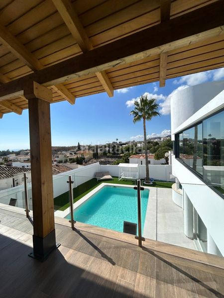 Foto 5709f096-41f3-4ecd-852f-a762afd9994e. Xalet amb aparcament piscina a Montealto - Monterrey Benalmádena