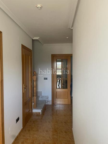 Foto 55b080a6-5925-4bf3-85c5-40f7928fa019. Casa aparellada amb calefacció aparcament a Carracedelo