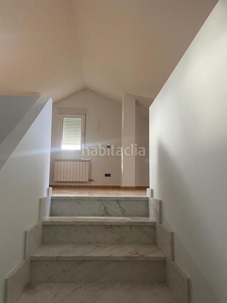 Foto cf833b62-7030-4612-9ae5-d114050a34e4. Casa aparellada amb calefacció aparcament a Carracedelo